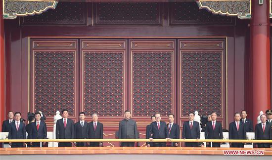 Chinese President Xi Jinping, also general secretary of the Communist Party of China (CPC) Central Committee and chairman of the Central Military Commission, is on the Tian'anmen Rostrum during the celebrations for the 70th anniversary of the founding of the People's Republic of China in Beijing, capital of China, Oct. 1, 2019. (Xinhua/Yan Yan)