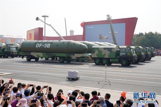 A formation of Dongfeng-5B nuclear missiles is reviewed during a military parade Tuesday in central Beijing, Oct. 1, 2019. (Photo/Xinhua)