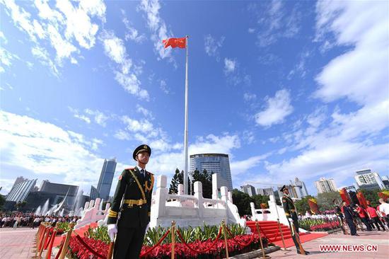 Photo taken on Oct. 1, 2019 shows a flag-raising ceremony to celebrate the 70th anniversary of the founding of the People's Republic of China in Fuzhou, capital of southeast China's Fujian Province. (Xinhua/Lin Shanchuan)