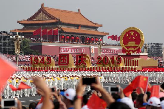A float featuring China’s national emblem travels past Tian’anmen Gate during a parade marking the 70th anniversary of the founding of the People's Republic of China, on its National Day in Beijing, China October 1, 2019. (Photo/China Daily)