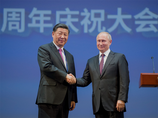 President Xi Jinping and his Russian counterpart Vladimir Putin attend a gathering marking the 70th anniversary of the establishment of diplomatic relations between the two countries in Moscow, Russia, June 5, 2019. （Photo/Xinhua）