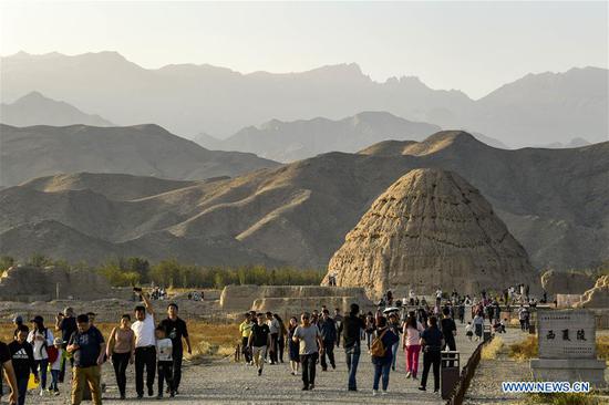 Tourists visit imperial tombs in China's Ningxia during National Day holiday