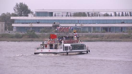 DPRK tourist facilities are only a strip of water away from Dandong City, northeast China's Liaoning Province. /CGTN Photo