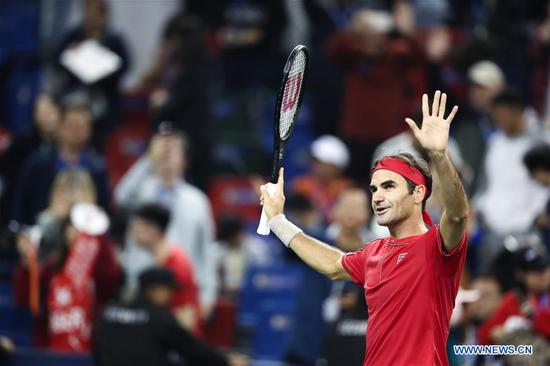 Federer reaches Shanghai Masters 3rd round