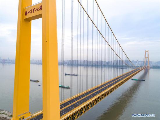 World's longest double-deck suspension bridge opens to traffic