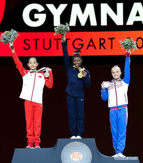 American gymnast Biles wins all-round, China's teenager Tang takes silver at worlds