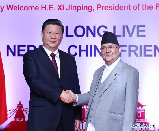 Chinese President Xi Jinping holds talks with Nepali Prime Minister K.P. Sharma Oli in Kathmandu, Nepal, Oct. 13, 2019. (Xinhua/Ju Peng)