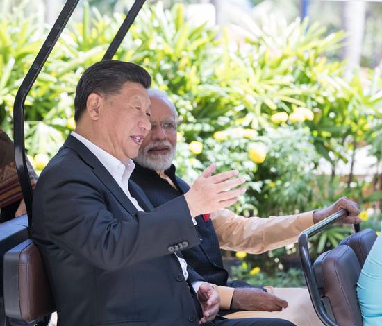 Chinese President Xi Jinping and Indian Prime Minister Narendra Modi continue their informal meeting in Chennai, India, Oct. 12, 2019. (Xinhua/Wang Ye)