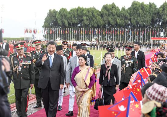 Chinese President Xi Jinping attends a welcome ceremony held by Nepali President Bidya Devi Bhandari upon his arrival at the airport in Kathmandu, Nepal, Oct. 12, 2019. Xi Jinping arrived in Kathmandu on Saturday for a state visit to Nepal. (Xinhua/Gao Jie)