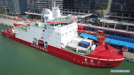 China's first homegrown polar icebreaker starts its maiden voyage