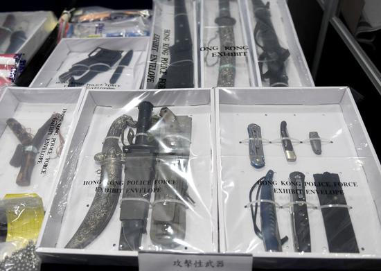 The Hong Kong police show at a press conference on Oct. 16, 2019 the assault weapons and the tools to make the assault weapons which were seized recently. (Xinhua)