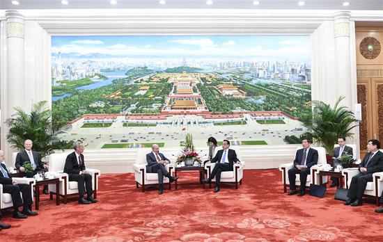 Chinese Premier Li Keqiang meets with a business delegation from the United States, which is led by Chairman of the U.S.-China Business Council (USCBC) Evan Greenberg, at the Great Hall of the People in Beijing, capital of China, Oct. 17, 2019. (Xinhua/Yin Bogu)