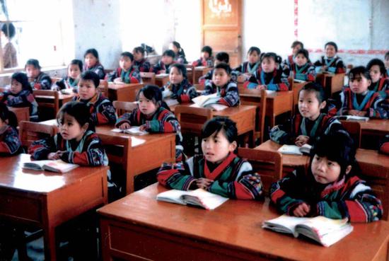 File photo of a class for girls in Yaokou Village, Baiyun Township, Rongshui County, southern China's Guangxi Zhuang Autonomous Region (Photo provided to Xinhua)