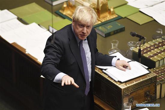 British Prime Minister Boris Johnson speaks at the House of Commons in London, Britain, on Oct. 22, 2019. Boris Johnson on Tuesday was defeated in a vote on his Brexit timetable, meaning his government could push for a general election. (Jessica Taylor/UK Parliament/Handout via Xinhua)