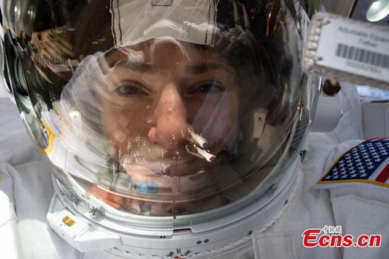 Smiling space selfies mark first ever all-female spacewalk