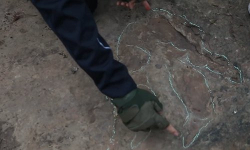 A dinosaur footprint dating back to the late Jurassic period was identified by Chinese paleontologists in Yibin, Southwest China's Sichuan Province on October 18. (Photo/Courtesy of Xing Lida)