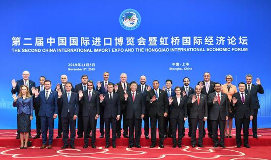 Chinese President Xi Jinping and foreign leaders pose for a group photo before the opening ceremony of the second China International Import Expo (CIIE) in Shanghai, east China, Nov. 5, 2019. (Xinhua/Xie Huanchi)