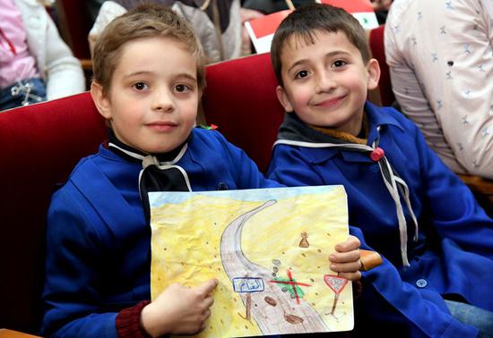 Young Syrians attend an awareness session about the danger of the conflict leftovers such as land mines in Damascus, capital of Syria, on March 7, 2019.(Xinhua/Ammar Safarjalani)