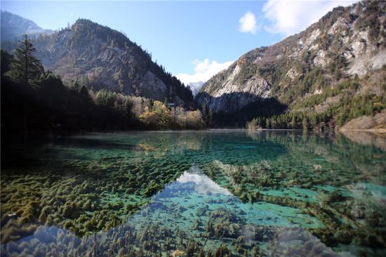 Jiuzhaigou National Park attracts tourists after reopening