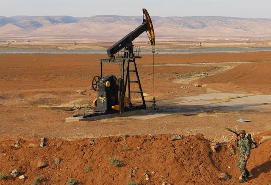 A Syrian soldier is seen in an oil field in the countryside of Qamishli, northeastern Hasakah province, Syria, on Nov. 5, 2019. (Str/Xinhua)