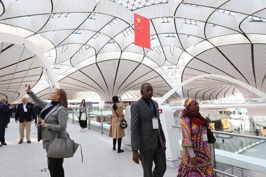 Foreign ambassadors and representatives visit Beijing Daxing International Airport on Nov. 12, 2019. (Photo/chinadaily.com.cn)