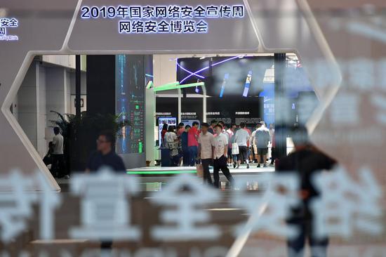 People visit the cybersecurity expo held at Tianjin Meijiang Convention Center in Tianjin, north China, Sept. 14, 2019. More than 100 cybersecurity and Internet enterprises take part in the expo. (Xinhua/Li Ran)