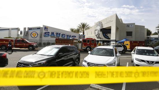 Police cordon off Saugus High School where a shooting took place in Santa Clarita, Southern California, the United States, on Nov. 14, 2019. (Xinhua/Li Ying)