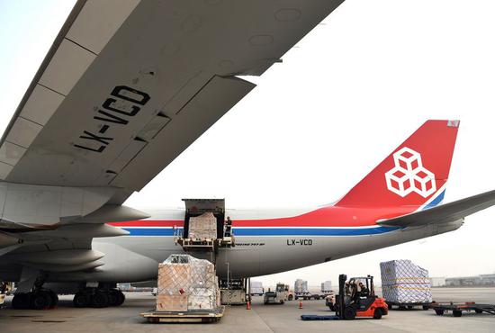 A plane loaded with imported flowers parks at Xinzheng International Airport in Zhengzhou, central China's Henan Province, Nov. 7, 2019. (Xinhua/Li Jianan)