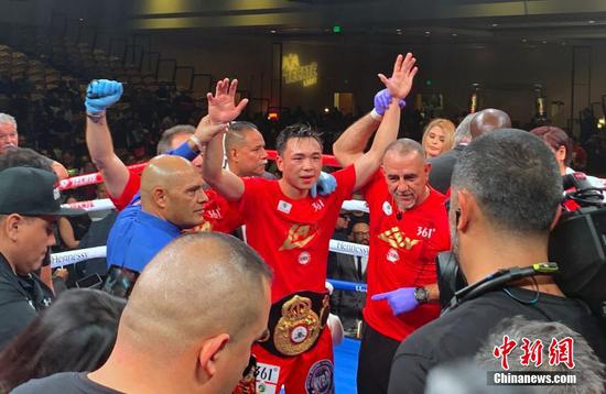 Chinese boxer Xu Can defends WBA featherweight title