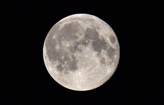 A full moon is pictured from Moscow on June 29, 2018. (Xinhua/Shi Hao)