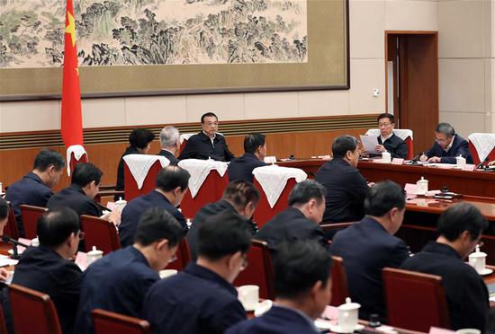 Chinese Premier Li Keqiang, also a member of the Standing Committee of the Political Bureau of the Communist Party of China (CPC) Central Committee, presides over a meeting on making the 14th Five-Year Plan (2021-2025) in Beijing, capital of China, Nov. 25, 2019. (Xinhua/Liu Weibing)