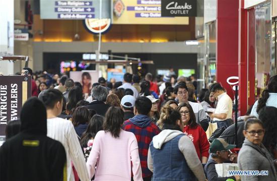 People do shopping for Black Friday sales at an outlet in Ontario, California, the United States, Nov. 29, 2019. (Xinhua/Li Ying)