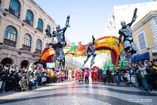 Parade held to celebrate 20th anniversary of Macao's return to motherland