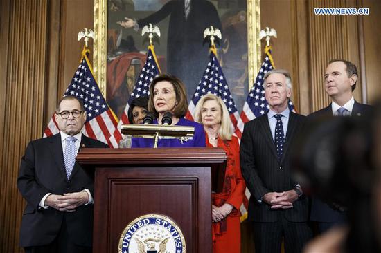 U.S. House Speaker Nancy Pelosi (C, Front) speaks at a news conference to announce articles of impeachment against U.S. President Donald Trump on Capitol Hill in Washington D.C., the United States, on Dec. 10, 2019.  (Photo/Xinhua)