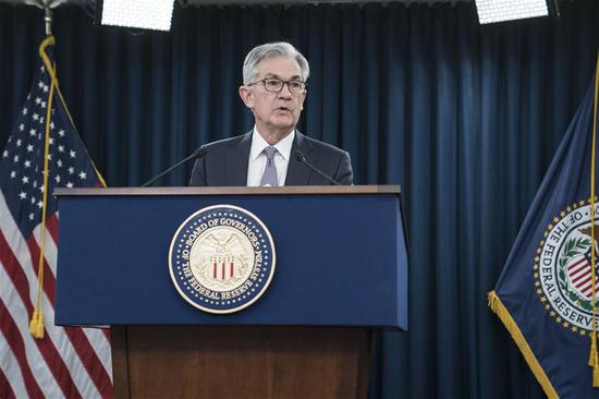 U.S. Federal Reserve Chairman Jerome Powell speaks during a press conference in Washington D.C., the United States, on Dec. 11, 2019. The U.S. Federal Reserve on Wednesday left interest rates unchanged after cutting rates at each of the last three meetings, as officials assessed the effect of rate cuts on the U.S. economy. (Photo by Sarah Silbiger/Xinhua)