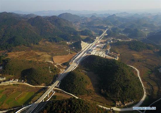 Aerial photo shows the Chengdu-Guiyang railway in Qingzhen in southwest China's Guizhou Province, Dec. 15, 2019.  (Photo/Xinhua)