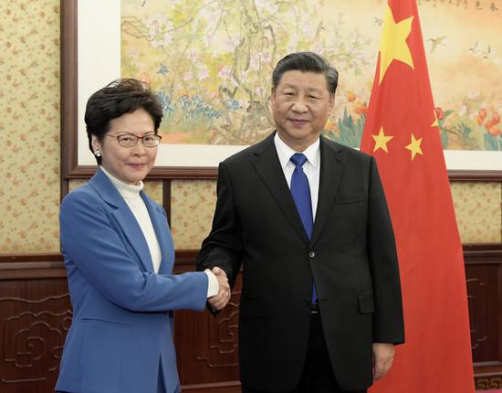 Chinese President Xi Jinping meets with Chief Executive of Hong Kong Special Administrative Region (HKSAR) Carrie Lam in Beijing, capital of China, Dec. 16, 2019. Carrie Lam is on a duty visit to Beijing. (Xinhua/Li Xueren)