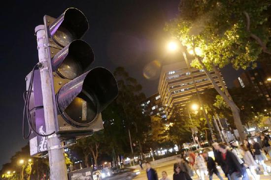 A vandalized traffic light is seen in East Tsim Sha Tsui of Hong Kong, southern China, Dec. 6, 2019. (Xinhua/Wang Shen)