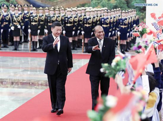 Chinese President Xi Jinping holds a welcome ceremony for Kiribati's President Taneti Mamau before their talks at the Great Hall of the People in Beijing, capital of China, Jan. 6, 2020. (Xinhua/Ding Lin)