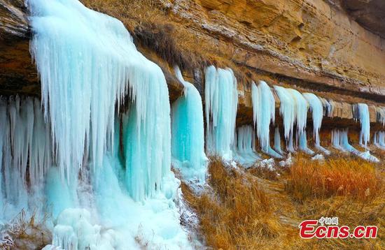 Ice waterfall formed on Gansu cliffs