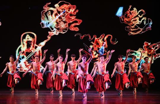 Chinese artists dance during a cultural exchange event on Friday in Rome, Italy. (CHENG TINGTING/XINHUA)