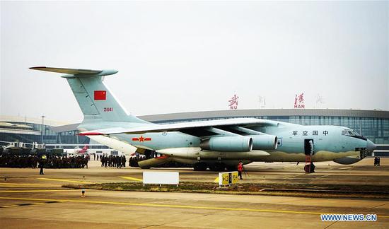 Military medical staff airlifted by eight large transport planes of the air force of the People's Liberation Army (PLA) arrive at Tianhe International Airport in Wuhan, central China's Hubei Province, Feb. 2, 2020. (Photo by Li Shining/Xinhua)