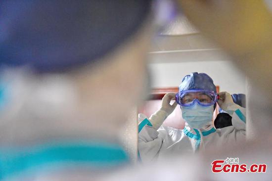 Medical workers stay at their posts in designated hospital in Shaoxing