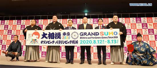 Vice president of Tokyo 2020 Toshiaki Endo (4th L), Sumo grand champions Hakuho (3rd L) and Kakuryu (2nd R) attend the press conference in Tokyo, Japan on Feb. 4, 2020. The Japan Sumo Association announced on Tuesday that it will hold a two-day tournament in August as part of the 2020 Tokyo Olympic and Paralympic cultural program. (Xinhua/Wang Zijiang)