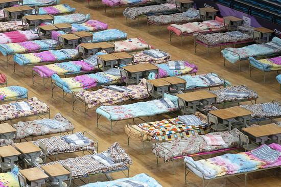 Photo taken on Feb. 4, 2020 shows an interior view of the Hongshan Gymnasium, a venue converted into a makeshift hospital to receive patients infected with the novel coronavirus. (Xinhua/Xiong Qi)