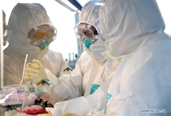 Virus-hit Wuhan speeds up diagnosis of patients