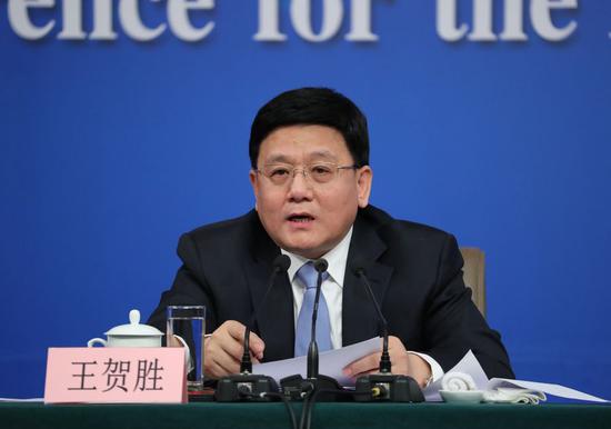 File photo shows Wang Hesheng, then deputy head of the National Health and Family Planning Commission, takes questions on health and family planning reforms at a press conference for the fifth session of the 12th National People's Congress in Beijing, capital of China, March 11, 2017. (Xinhua/Zhang Yuwei)
