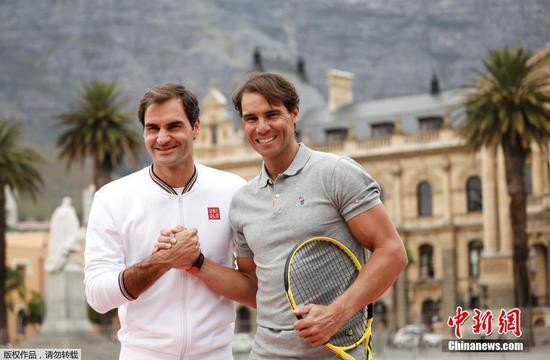 Federer, Nadal play to record crowd in Cape Town