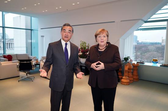 German Chancellor Angela Merkel (R) meets with visiting Chinese State Councilor and Foreign Minister Wang Yi in Berlin, Germany, Feb. 13, 2020. (Xinhua/Wang Qing)