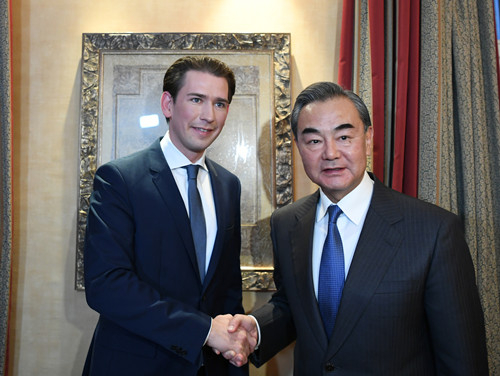 Chinese State Councilor and Foreign Minister Wang Yi (R) shakes hands with Austrian Chancellor Sebastian Kurz on the sidelines of the Munich Security Conference, in Munich, Germany, February 14, 2020. /Photo via Chinese Foreign Ministry website
